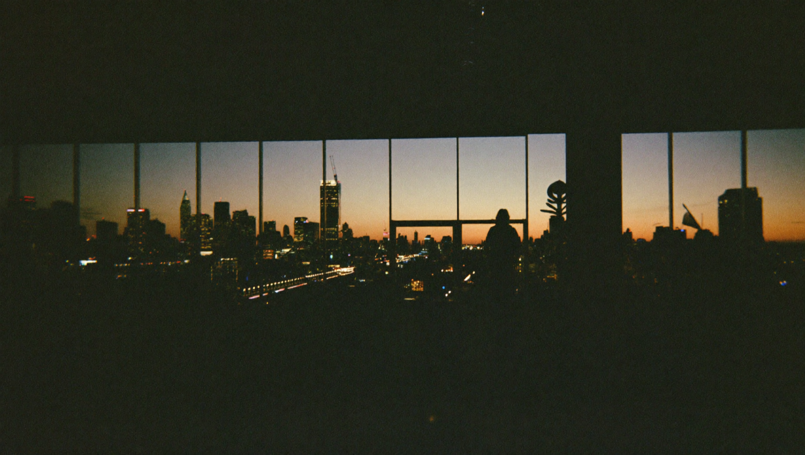 Dawn over the city through the club windows